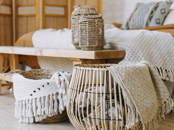 Foot of bed with natural fiber baskets